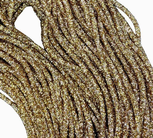 Rhinestone Cord - 6MM Full Round, luxurious golden trim with sparkling rhinestones, perfect for enhancing any design.