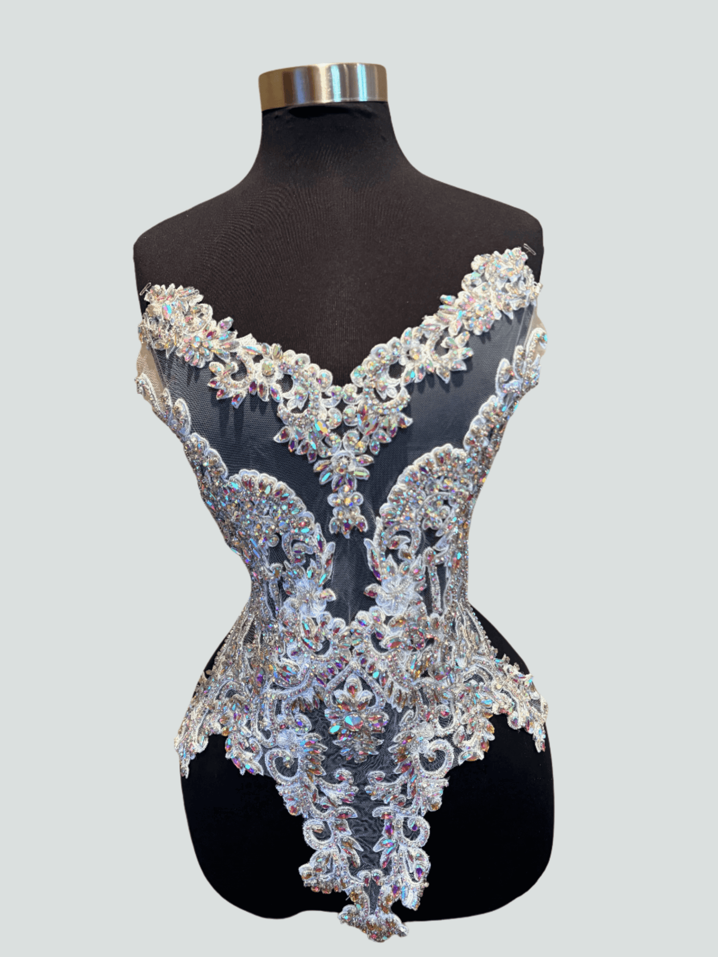 Rhinestone Bodice Applique showcasing dazzling rhinestones and intricate beadwork on a form-fitting design.
