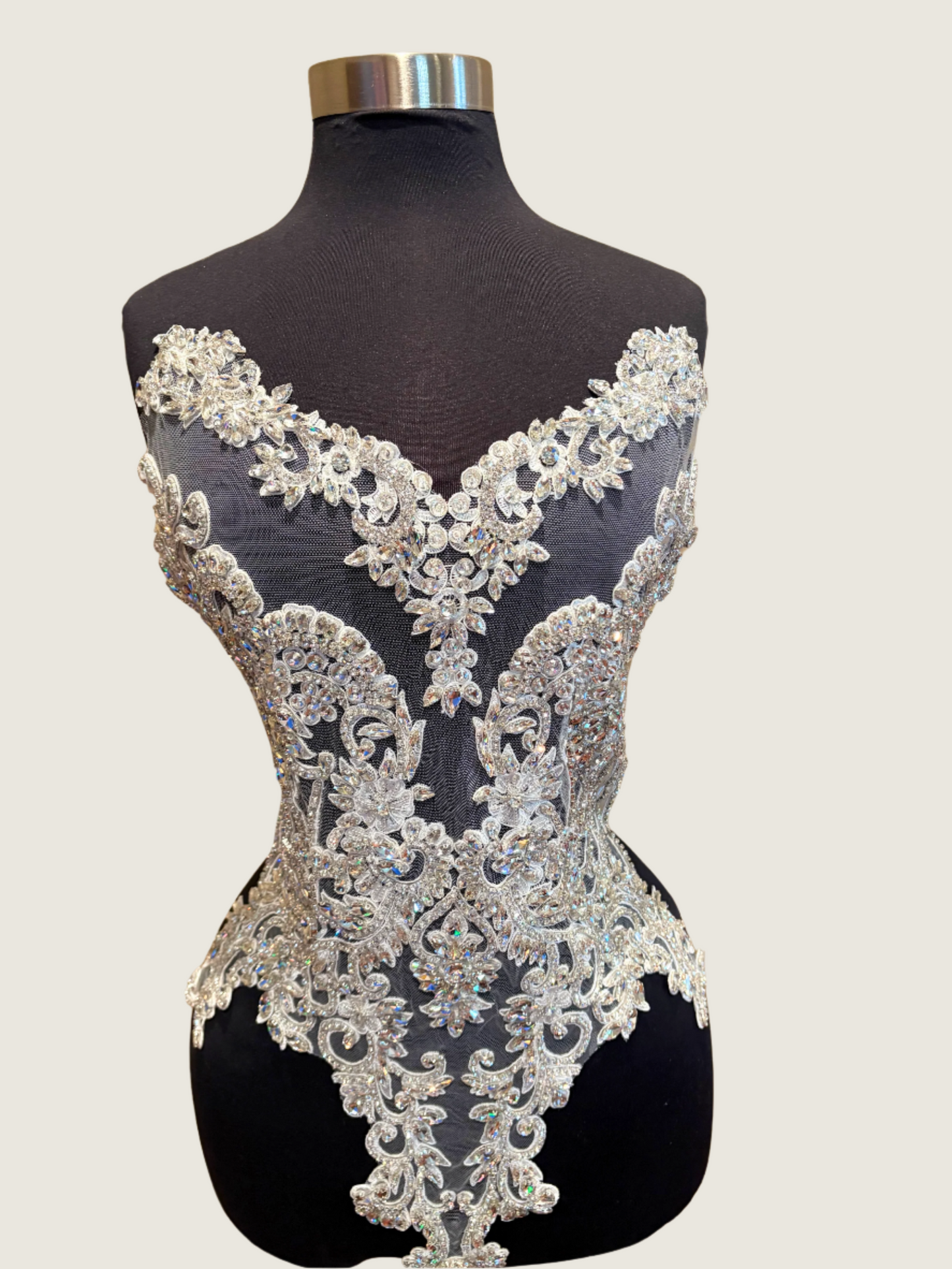 AB Crystal Handmade rhinestone bodice applique on mannequin, featuring intricate beadwork and premium materials for elegant designs.