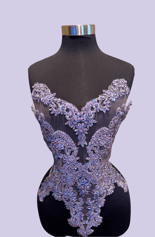 Rhinestone Bodice Applique showcasing intricate beadwork and dazzling rhinestones on a dress form.
