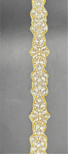 Emma's Yardage handmade rhinestone trim with intricate design and colorful accents.