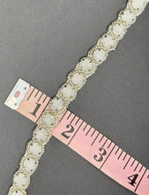 Opal Elegance Yardage with silver setting trim, 1/4" wide, opal stones, measuring tape.