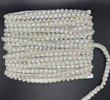 Opal Elegance Yardage featuring opal stones in silver setting, 1/4" wide trim for crafts and decor.
