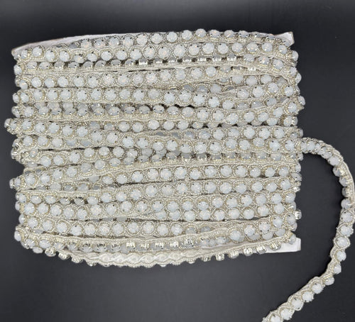 Opal Elegance Yardage featuring opal stones in silver setting, 1/4