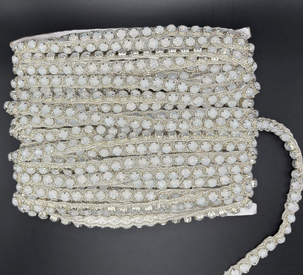 Opal Elegance Yardage featuring opal stones in silver setting, 1/4