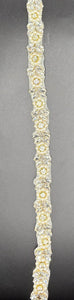 Natalie's Yardage with pearls and rhinestones in various colors.