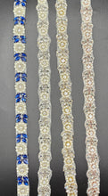 Natalie's Yardage with rhinestones and pearls in various colors.
