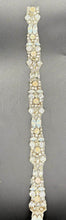 Madison's Yardage clear rhinestones and opals strip.