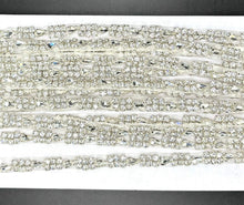 Simply Stunning Yardage rhinestone trim with sparkling stones in various colors, ideal for embellishments.