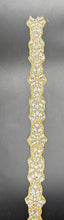 Emma's Yardage handmade rhinestone trim with various colors.
