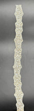Emma's Yardage handmade rhinestone trim with intricate design.