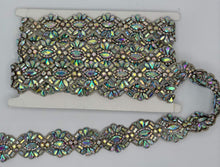 Extravagant rhinestone yardage with AB rhinestones, 1 3/8" wide, ideal for luxury fashion and decor projects.