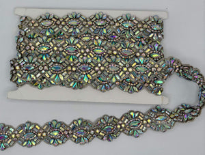 Extravagant rhinestone yardage with AB rhinestones, 1 3/8" wide, ideal for luxury fashion and decor projects.