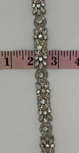 Clear rhinestones and glass beads trim with silver setting, Mia's Yardage, 1/2" width.