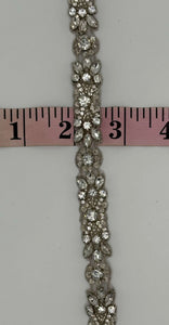 Clear rhinestones and glass beads trim with silver setting, Mia's Yardage, 1/2" width.