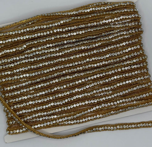Beaded and rhinestone yardage with small handmade beads, approximately 3/8