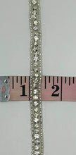 Beaded and rhinestone yardage trim, approximately 3/8 inch wide, displayed beside a measuring tape.