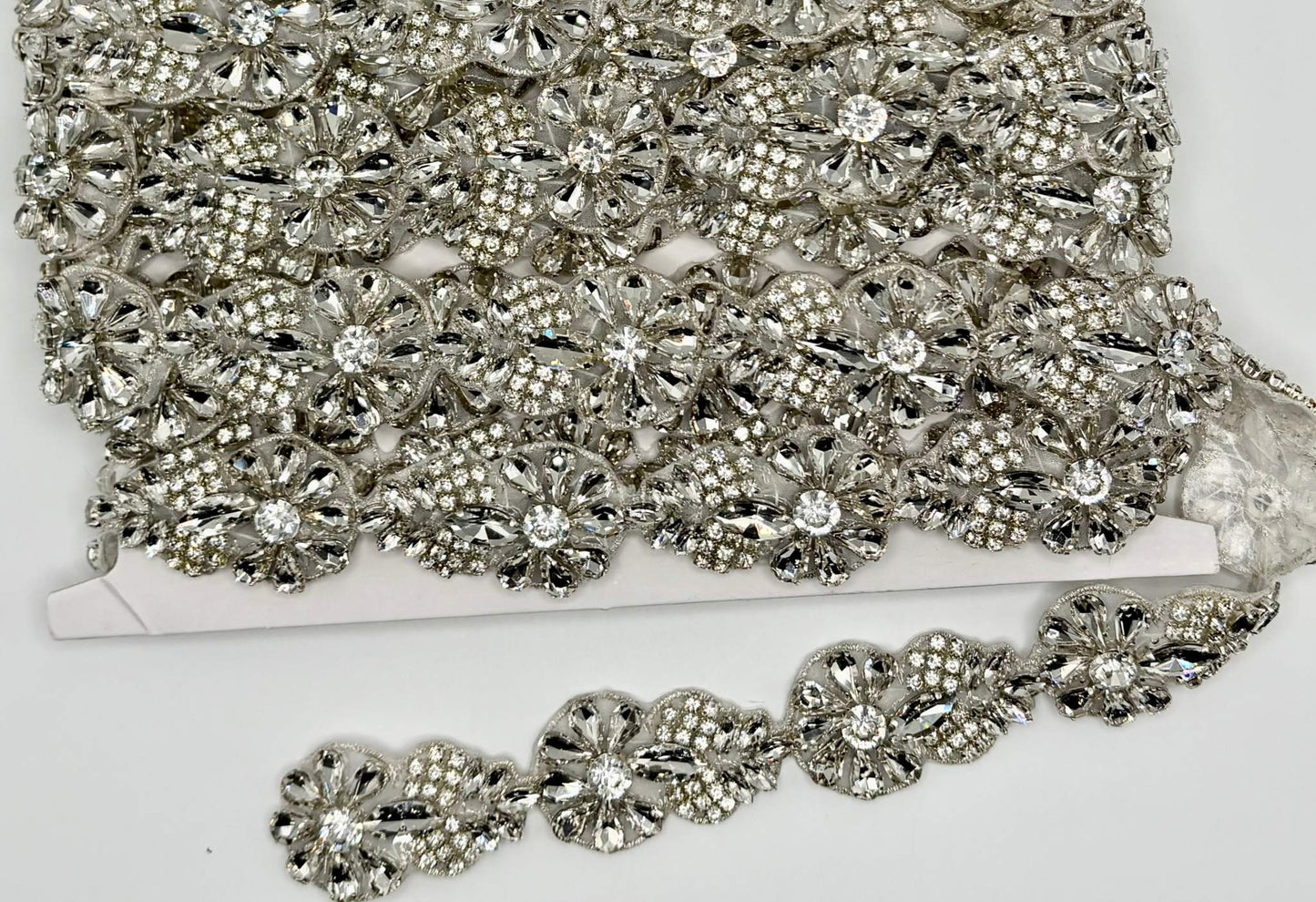 "Brilliant Rose" handmade rhinestone trim yardage with floral design.