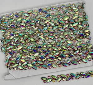 Rhinestone chain yardage with colorful sparkling stones on a card, approx. 1/4" wide.