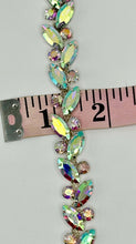 Rhinestone Chain Yardage measuring 1/4 inch wide with sparkling rhinestones on a flexible chain.