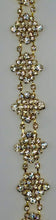 Tiny rhinestone cluster yardage, clear rhinestones on gold, 1-inch width.