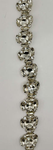 Large rhinestone cluster on chain back yardage, clear/silver, 1-inch width.