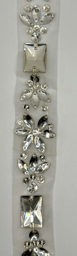 Grandiose Original rhinestone yardage with intricate design on chain backing.