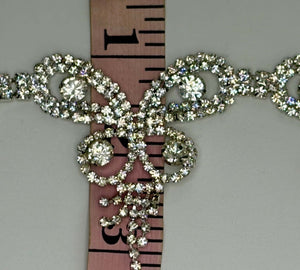 "La Bella" clear crystal rhinestone yardage, approximately 2 inches wide.