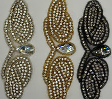 Romance Yardage rhinestone trim in silver, gold, and black.