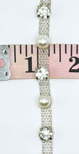 Pearl and Rhinestone yardage with single row 1/4" width on chain.