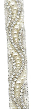 Pearl with rhinestone swirl yardage trim, handmade and approximately 1 inch wide.