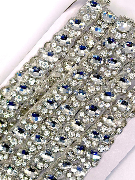 Handmade "Annah" Rhinestone yardage on silver trim, approximately 1/2 inch wide.