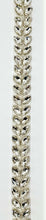 Ellah Yardage handmade rhinestone trim on silver setting, approximately 5/8 inch wide.