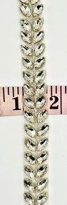 Ellah Yardage rhinestone trim on silver setting, approximately 5/8 inch wide.