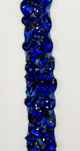 Handmade multi-stone yardage with vibrant blue rhinestones on a 1-inch wide trim.