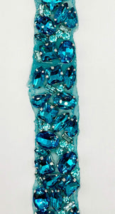 Handmade multi-colored rhinestone yardage, 1" wide, featuring vibrant stones for versatile embellishments.