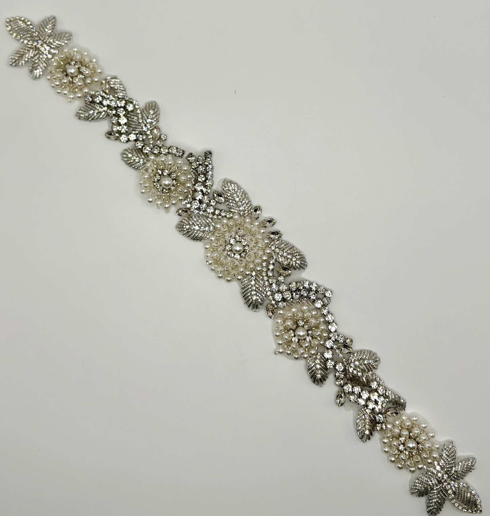 Rhinestone and pearls bridal belt with intricate handmade appliqué design.
