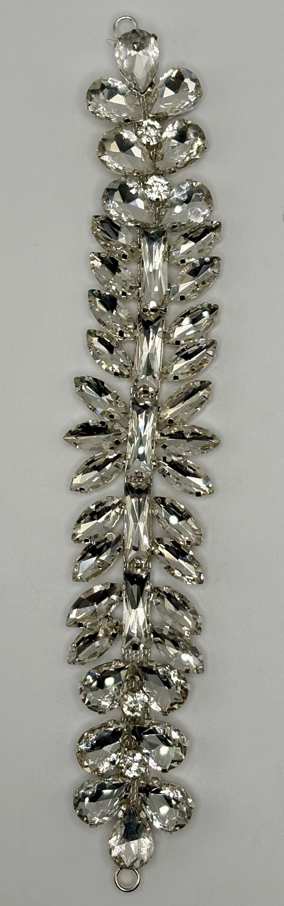 Rhinestone accent chain back, 7 inches long and 1.25 inches wide.