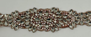 Handmade rhinestone bridal belt with clear rhinestones, pearls, and glass beads in gold.