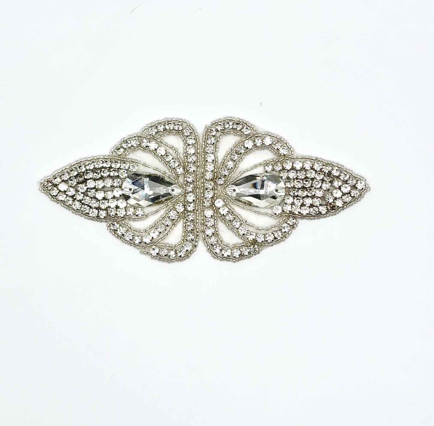 Handmade rhinestone accent with intricate design, approximately 6 inches in length.