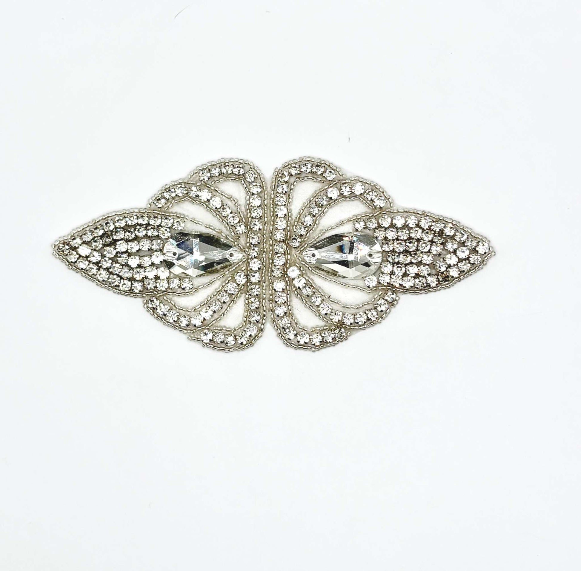 Handmade rhinestone accent with intricate design, approximately 6 inches in length.