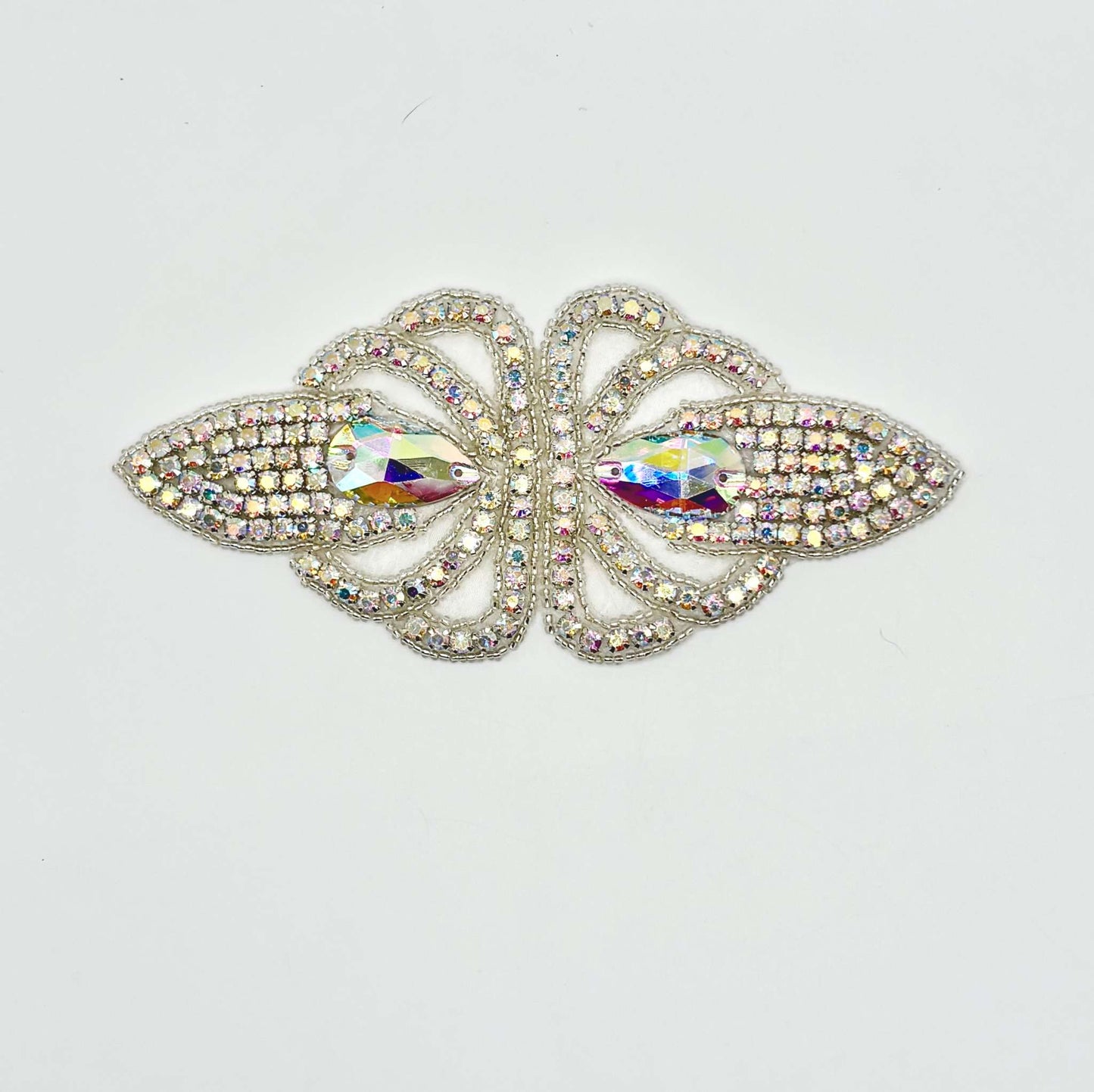 Handmade rhinestone accent with intricate design, 6 inches in length.