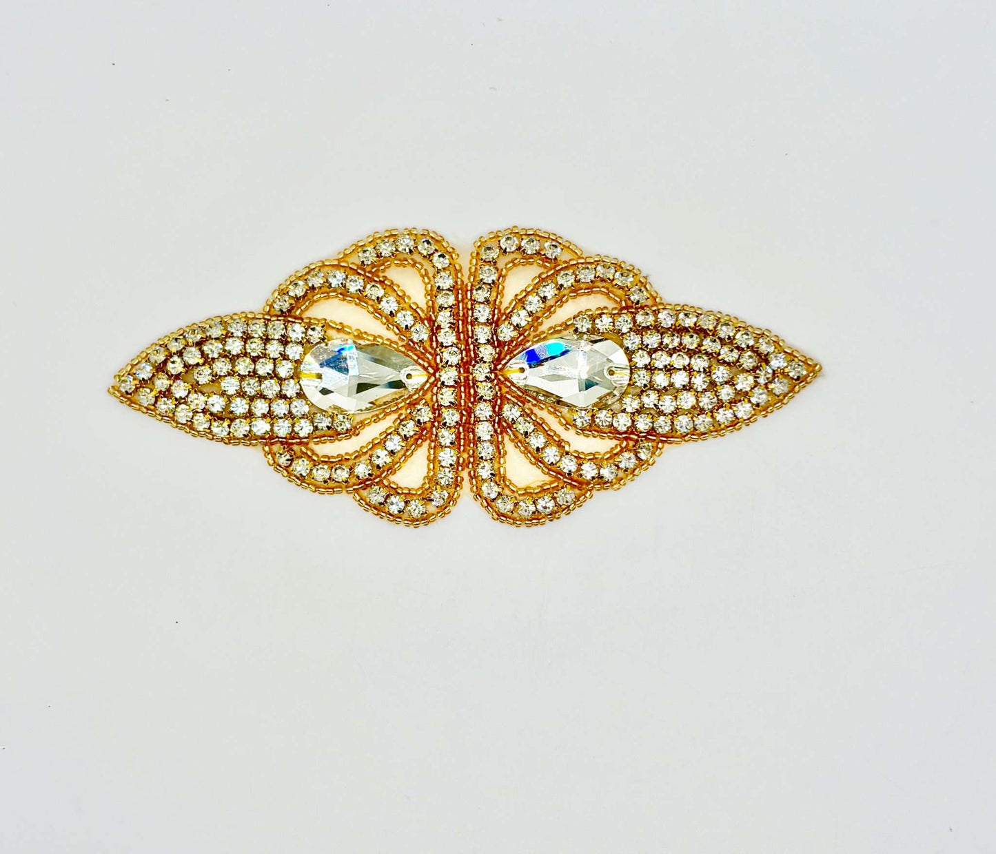 Handmade rhinestone accent approximately 6 inches long with intricate design.