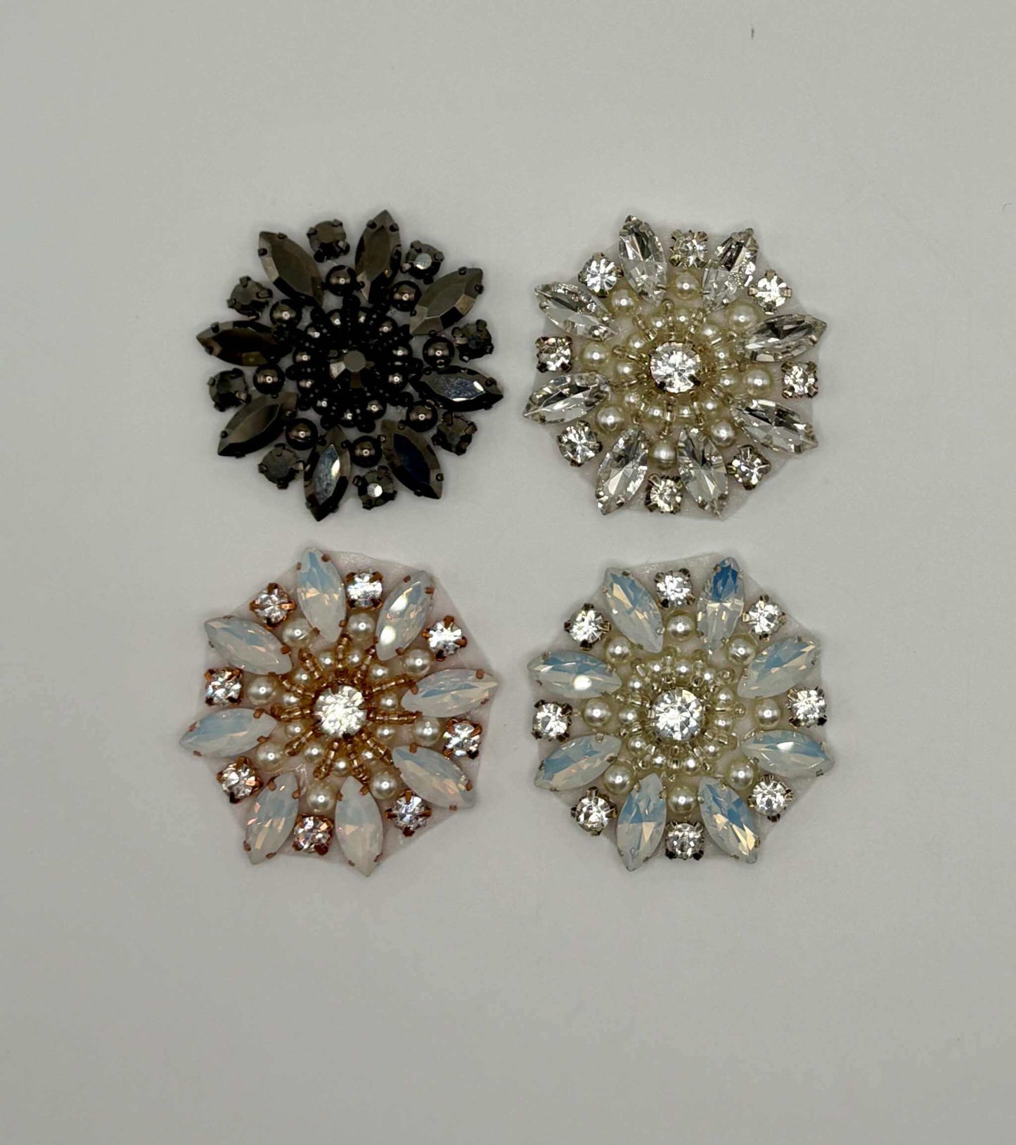 "Olivia Medallion" rhinestone and pearls applique, round handmade design, showcases in multiple colors.