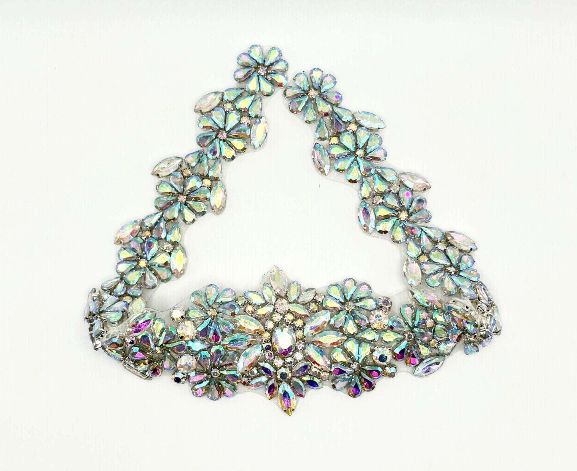 Carina rhinestone belt accent with floral design in AB finish on silver.