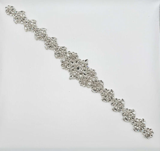 Carina Rhinestone Belt Accent in silver with intricate design and sparkling rhinestones.